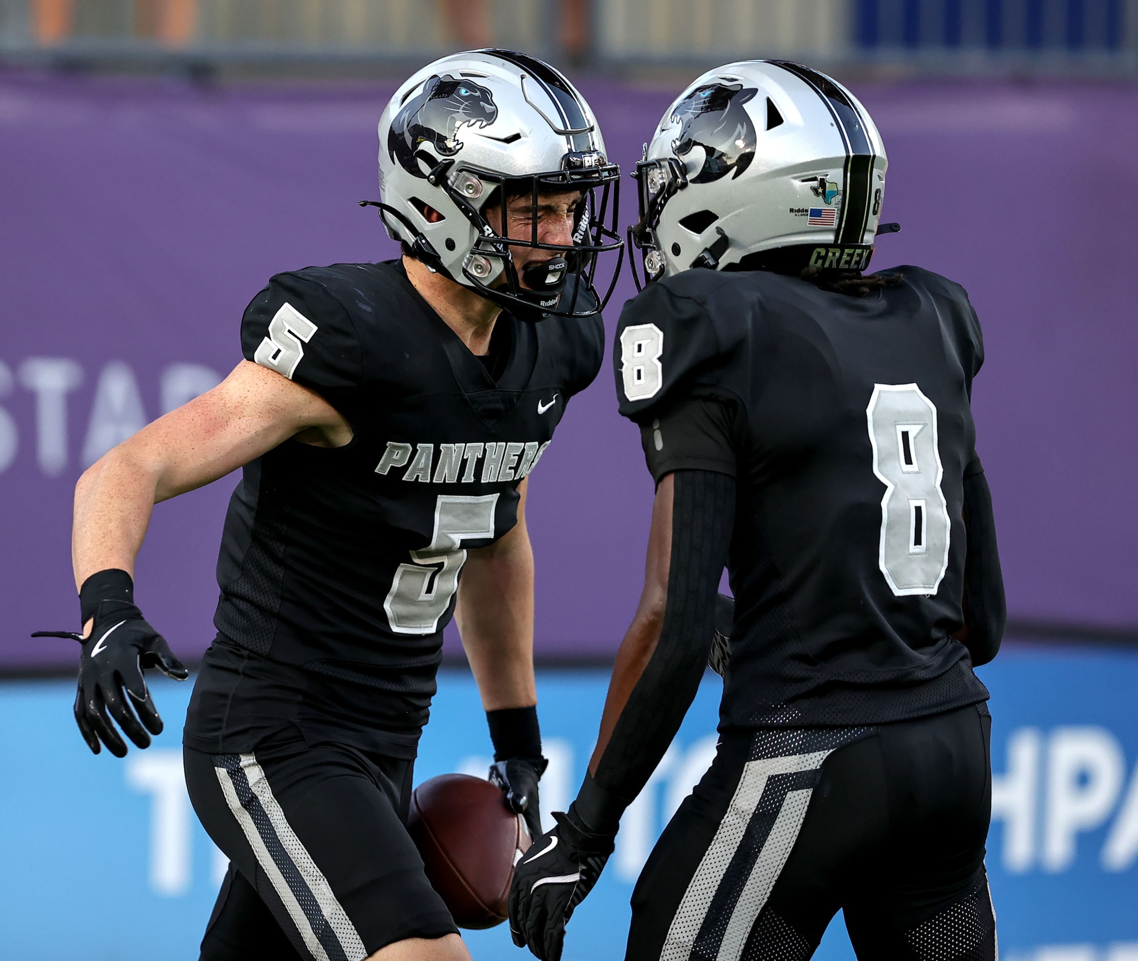 Frisco Panther Creek wide receiver Parker Ord (5) celebrates with wide receiver Caleb...