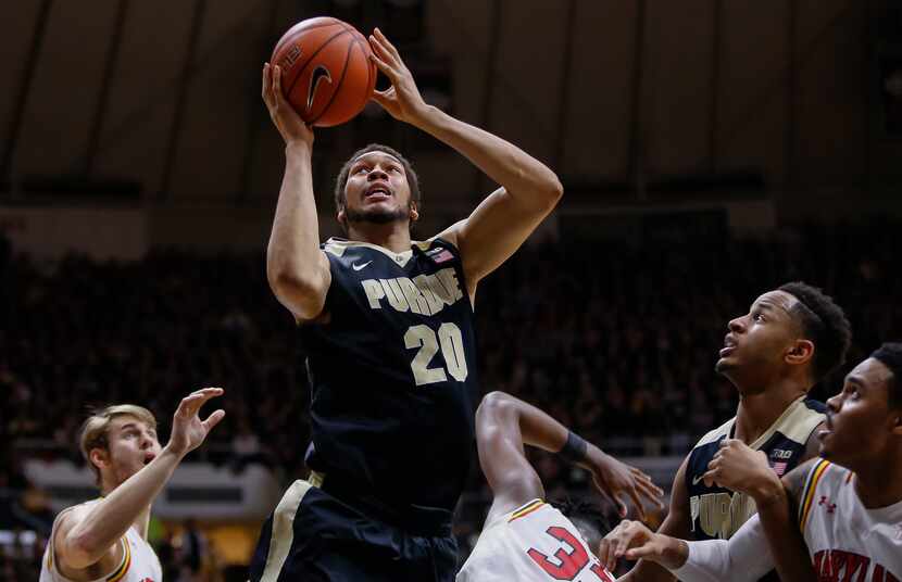 A.J. Hammons #20 of the Purdue Boilermakers shoots the ball against the Maryland Terrapins...