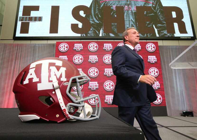 Texas A&M head coach Jimbo Fisher arrives for his SEC Media Days press conference at the...