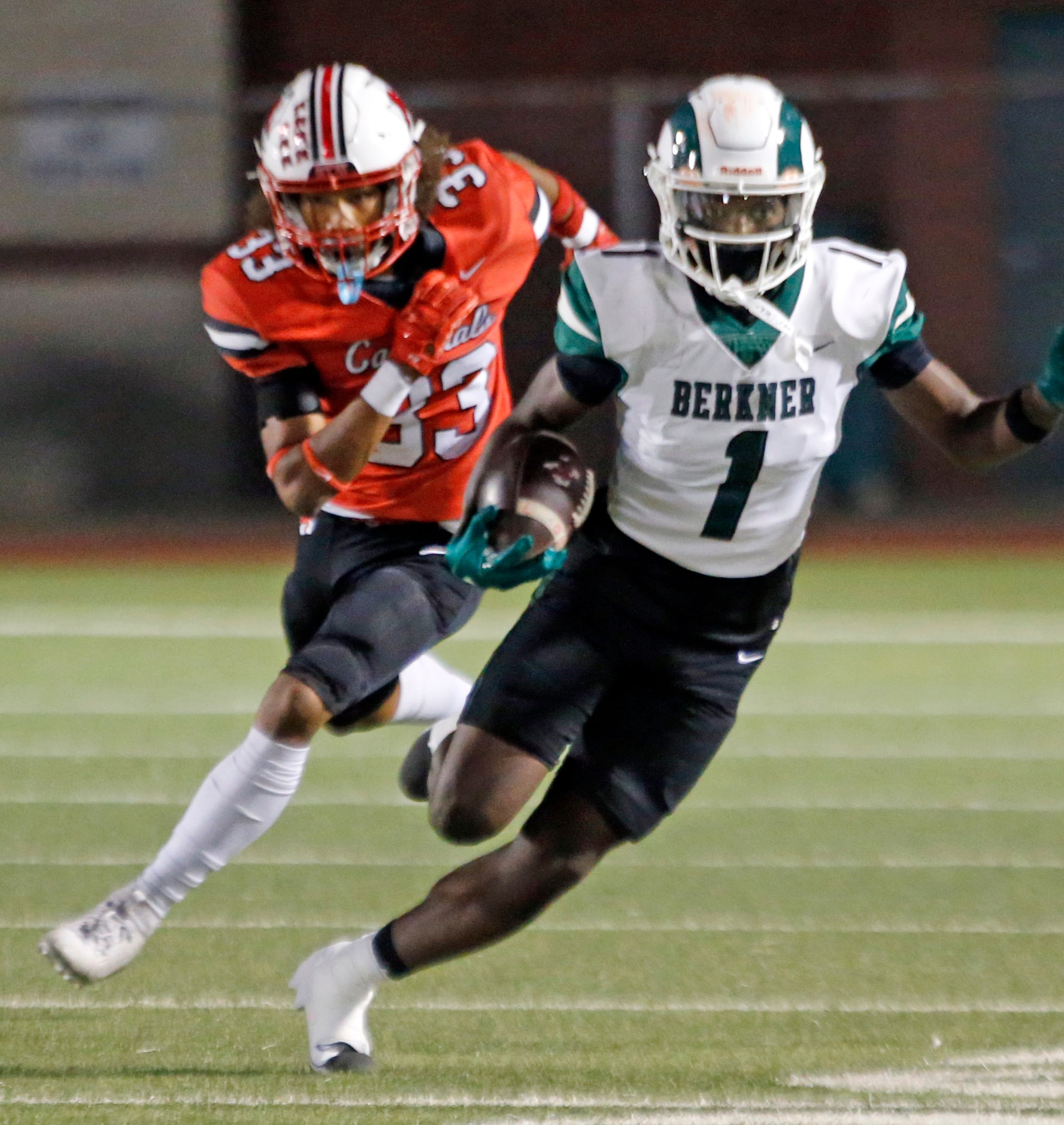 Richardson Berkner High’s Kobi Forman (1) runs for a first down, as he is chased by Irving...