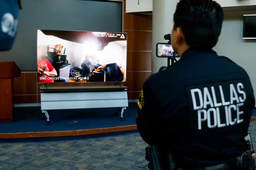 Body-cam footage is shown as Dallas police Chief Eddie García provides an update on an...
