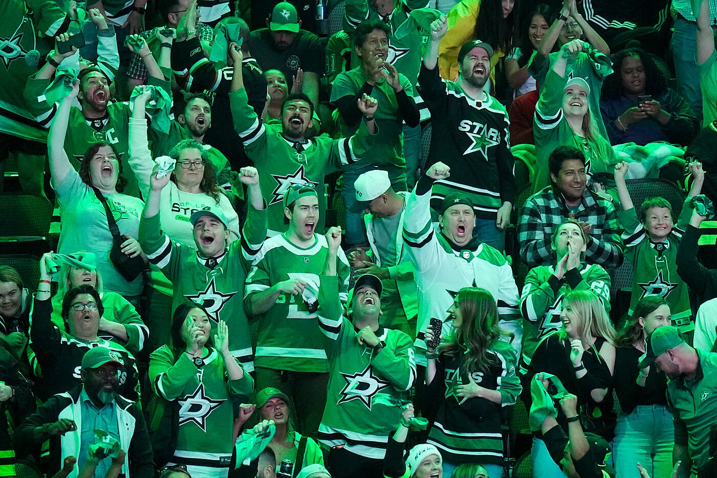 Dallas Stars fans cheer a first period goal by left wing Jason Robertson during a watch...