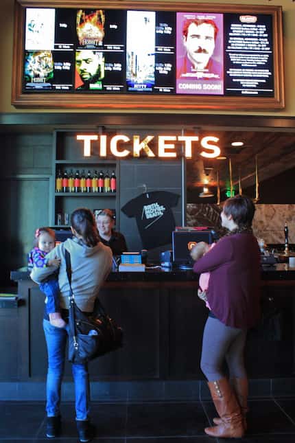 Moviegoers buy tickets at Alamo Drafthouse in Richardson