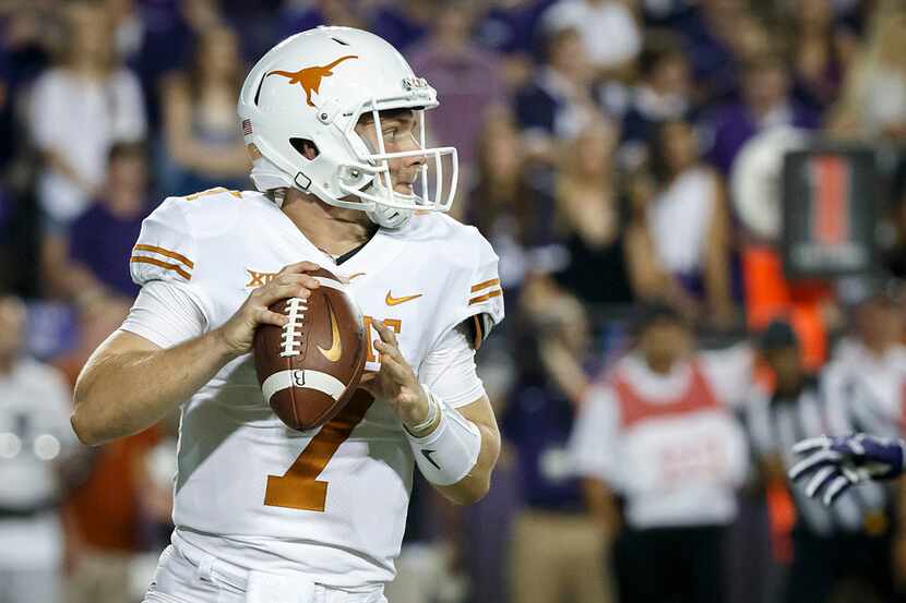 Texas quarterback Shane Buechele (7) throws a pass during the first half of an NCAA football...
