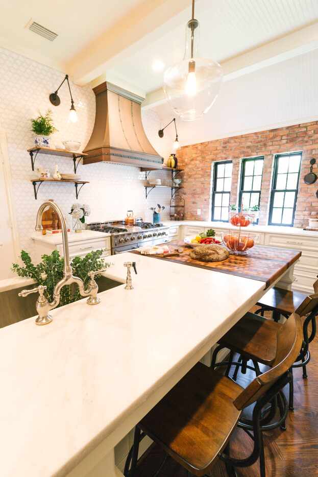 Tara Lenney eased the architecture toward a more Parisian style in this North Texas kitchen...