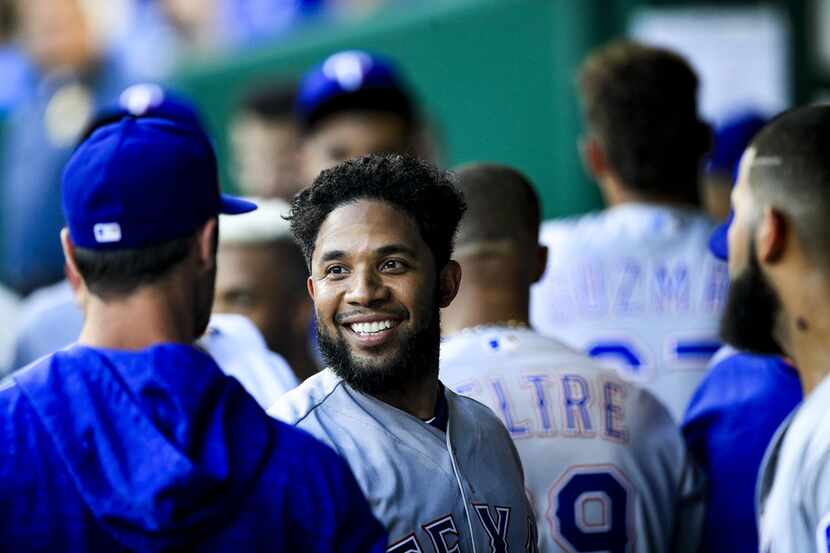 KANSAS CITY, MO - JUNE 18: Elvis Andrus #1 of the Texas Rangers smiles after scoring a run...