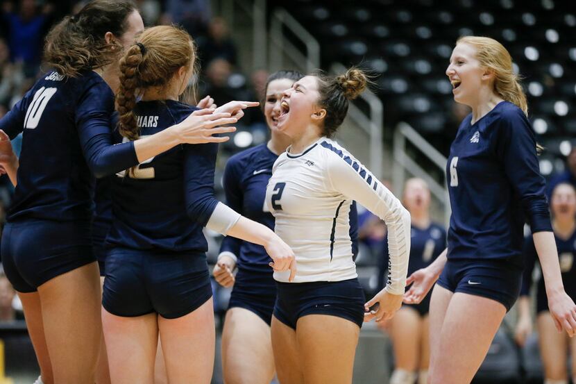 Flower Mound junior Sarah Martinez (2) celebrates a point with her teammates during a Class...