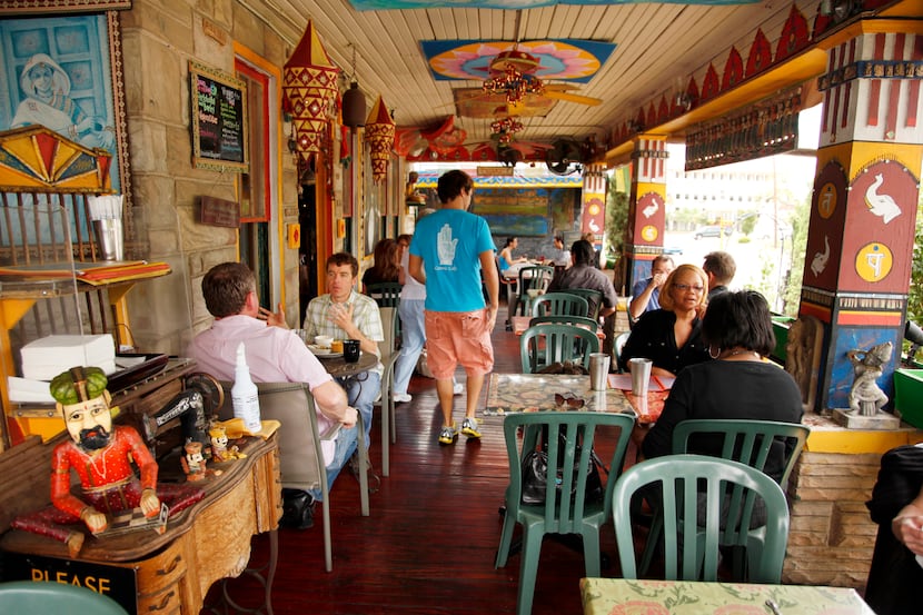 The lunch crowd on the patio at Cosmic Cafe, photographed April 26, 2012.