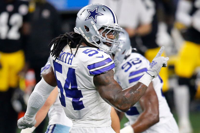Cowboys middle linebacker Jaylon Smith (54) celebrates a pass breakup during the fourth...