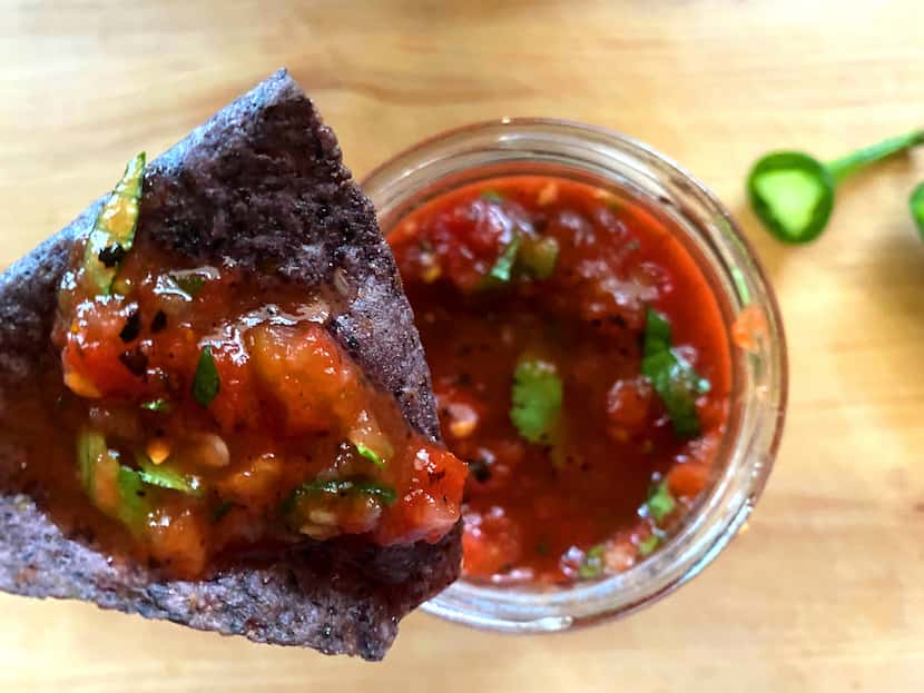 Fire-roasted tomatoes are the base of an easy homemade salsa. Just add onion, garlic,...