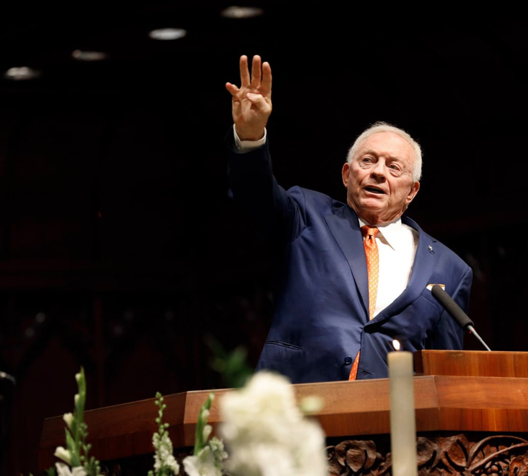 Dallas Cowboys owner Jerry Jones raises four fingers indicating the fourth quarter of life...