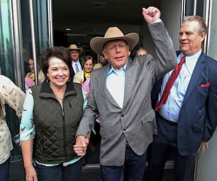 Cliven Bundy walks out of federal court with his wife, Carol, in Las Vegas in January....