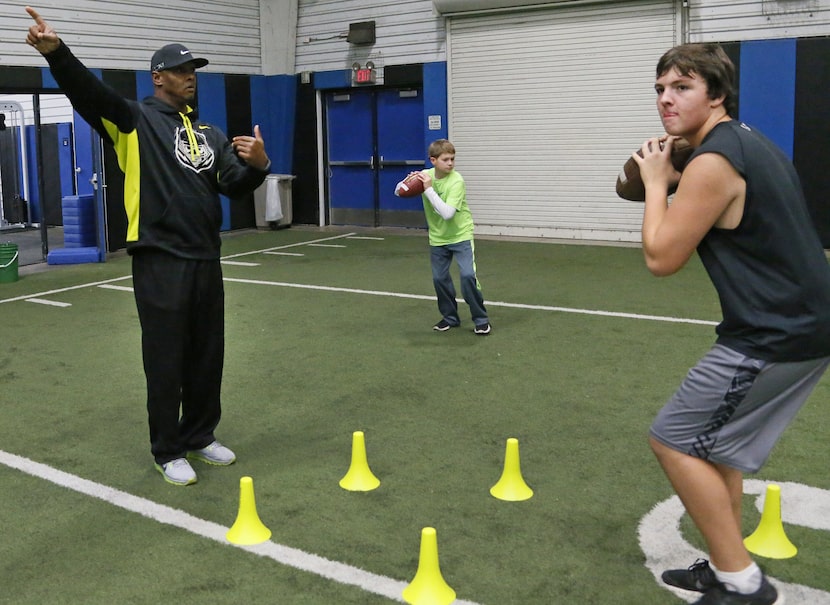 Former Texas A&M quarterback Kevin Murray works as a quarterbacks coach with 16-year-old...