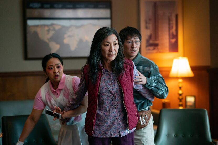 This image released by A24 Films shows, from left, Stephanie Hsu, Michelle Yeoh and Ke Huy...