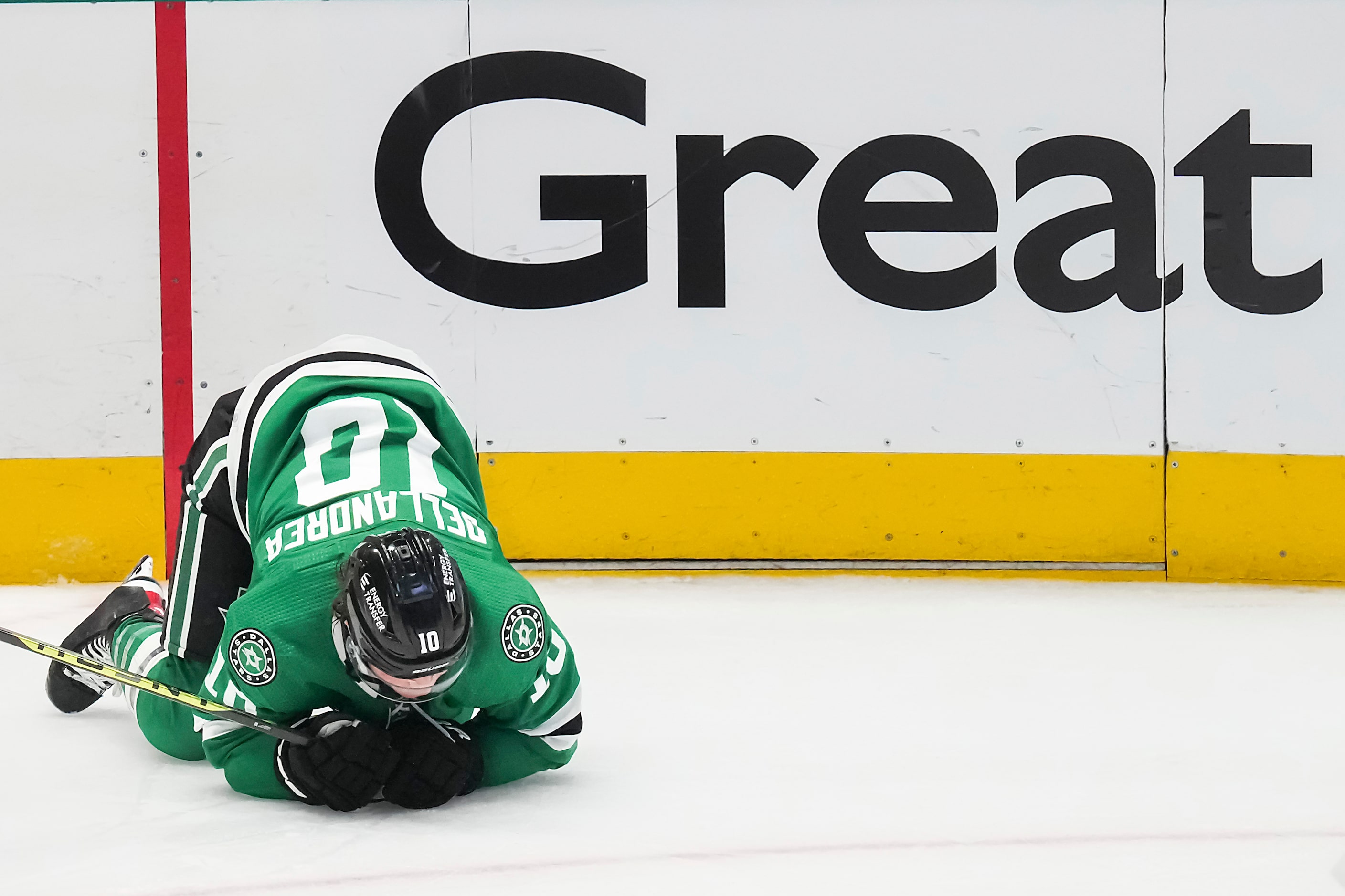 Dallas Stars center Ty Dellandrea (10) is slow to get up after a hit during the second...