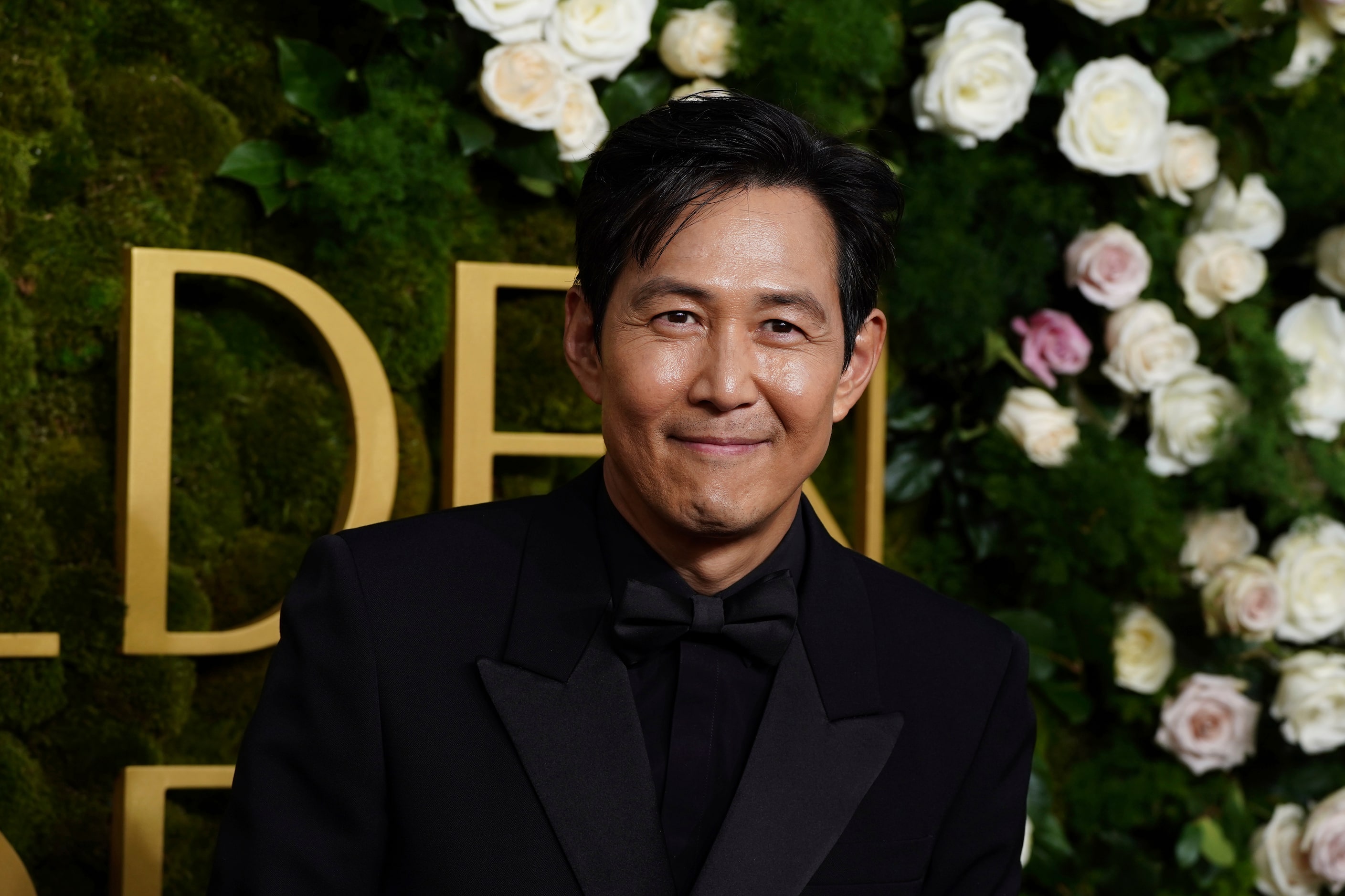 Lee Jung-jae arrives at the 82nd Golden Globes on Sunday, Jan. 5, 2025, at the Beverly...