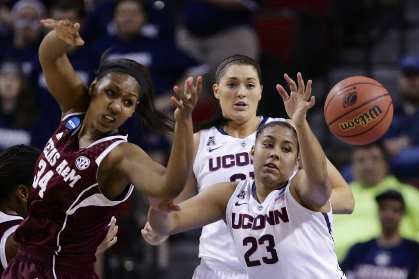 Texas A&M's Karla Gilbert (34), Connecticut's Kaleena Mosqueda-Lewis (23) and Connecticut's...