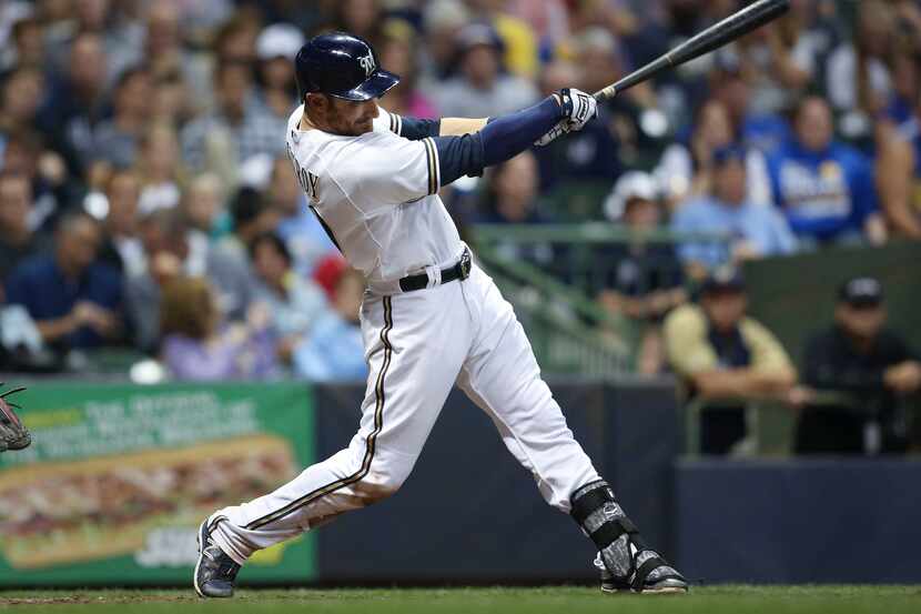 MILWAUKEE, WI - AUGUST 29: Jonathan Lucroy #20 of the Milwaukee Brewers hits a single during...