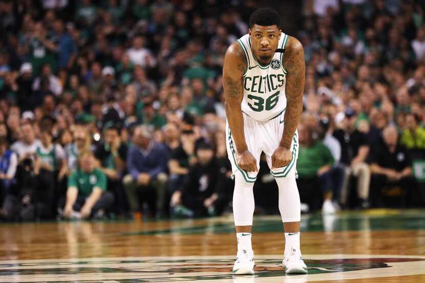 BOSTON, MA - MAY 27: Marcus Smart #36 of the Boston Celtics looks on during Game Seven of...