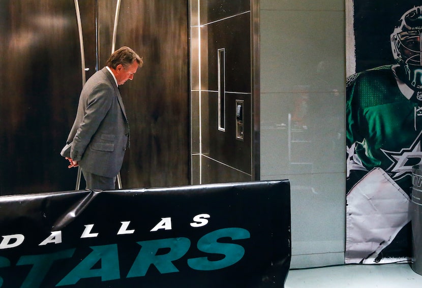 Dallas Stars interim head coach Rick Bowness takes a moment to himself prior to heading to...