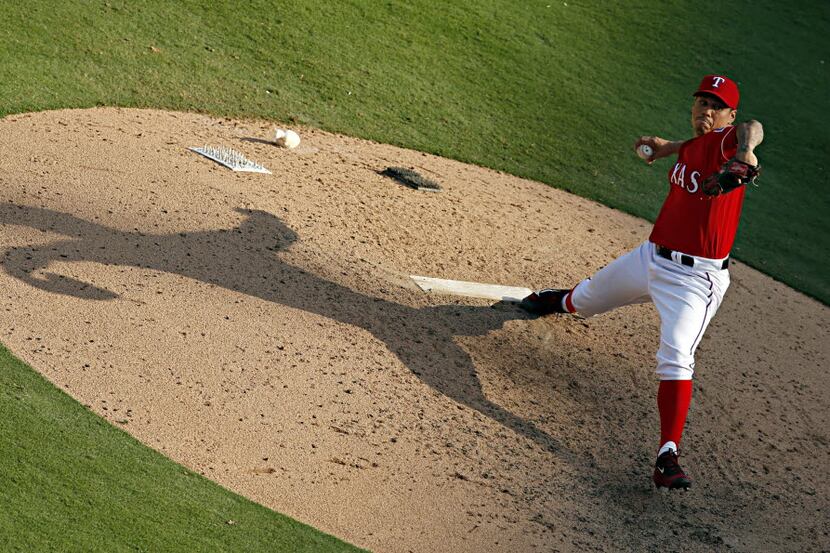 Texas Rangers relief pitcher Keone Kela throws during the seventh inning of Texas' 12-4 win...