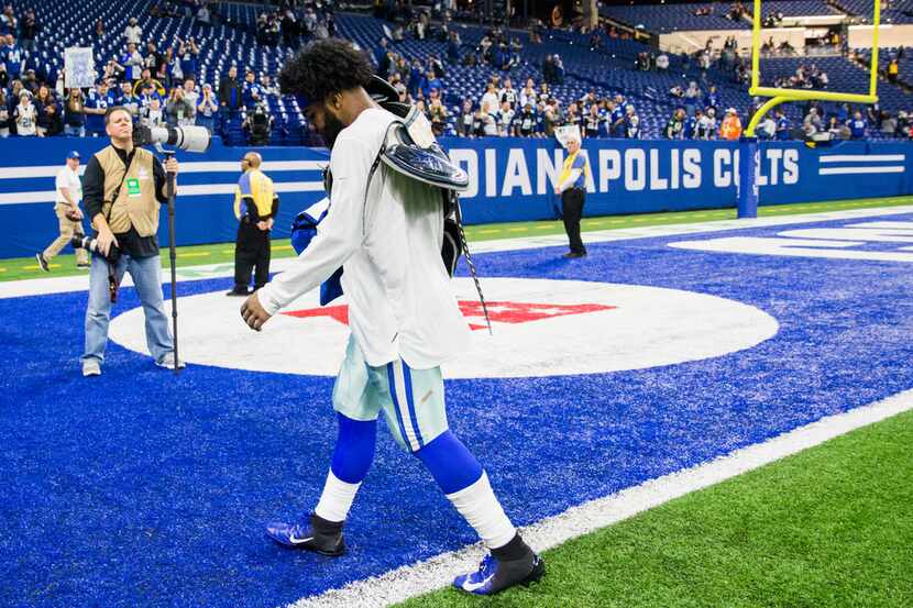 Dallas Cowboys running back Ezekiel Elliott (21) leaves the field after an NFL game between...