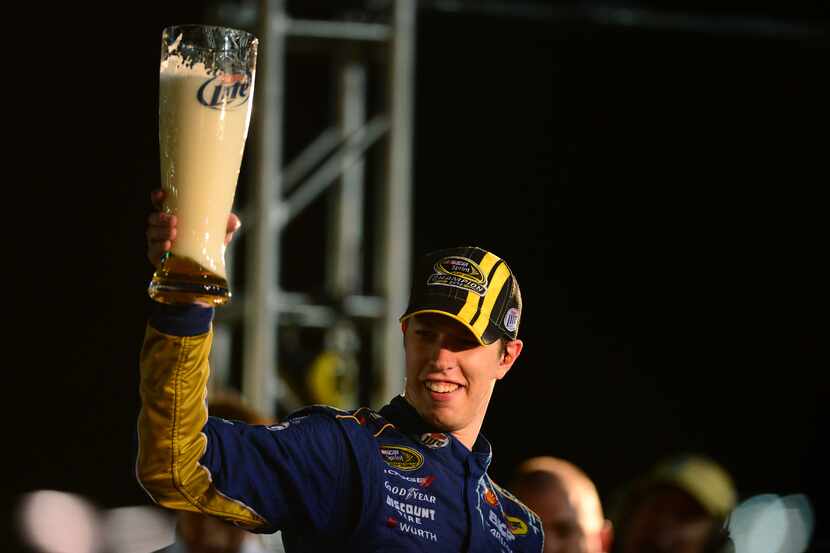 Nov 18, 2012; Homestead, FL, USA; NASCAR Sprint Cup Series driver Brad Keselowski celebrates...