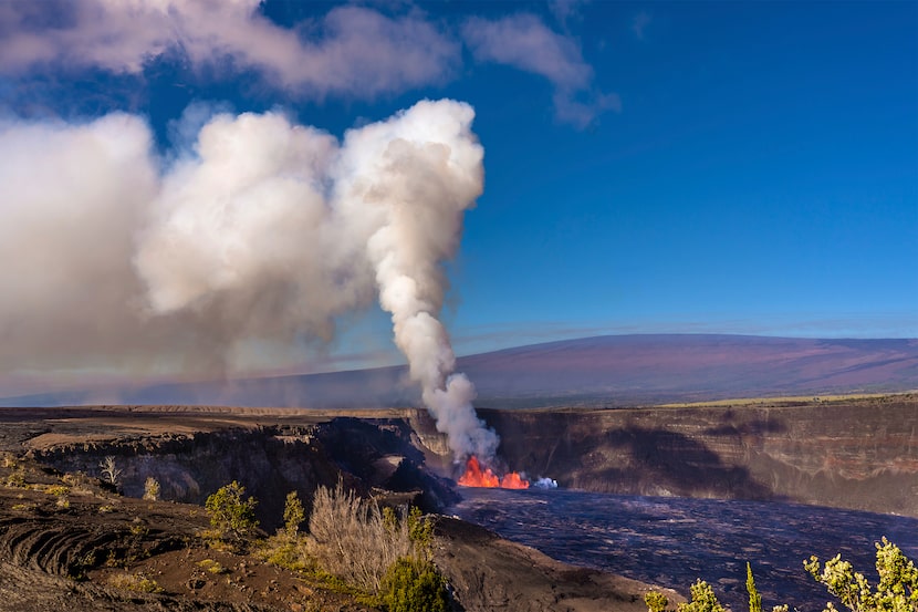 In this photo provided by the National Park Service, an eruption takes place on the summit...