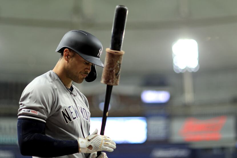 ST PETERSBURG, FLORIDA - SEPTEMBER 24: Giancarlo Stanton #27 of the New York Yankees looks...