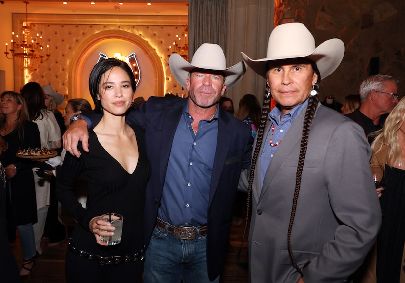 Kelsey Asbille, Taylor Sheridan, and Mo Brings Plenty attend the premiere for Paramount...