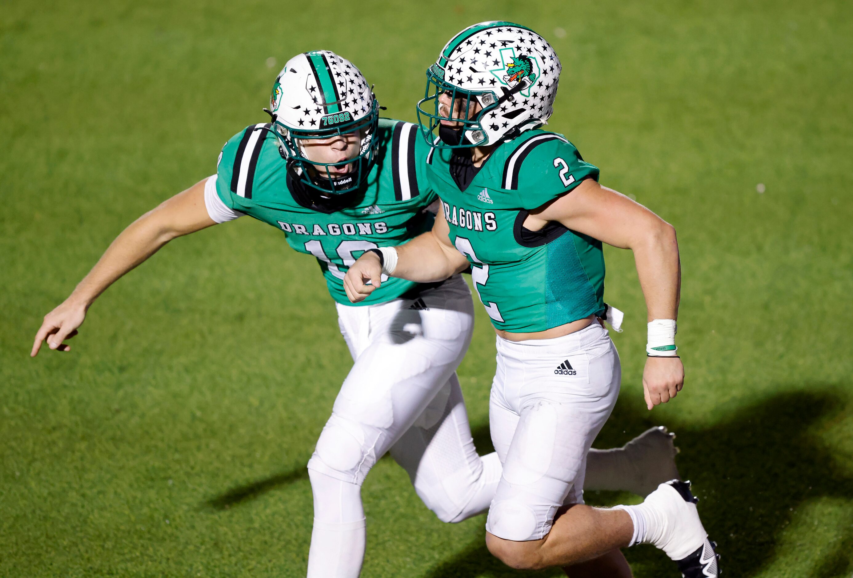 Southlake Carroll running back Owen Allen (2) is congratulated on his third quarter...