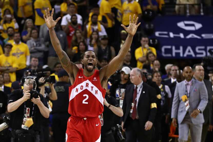 OAKLAND, CALIFORNIA - JUNE 13:  Kawhi Leonard #2 of the Toronto Raptors celebrates his teams...