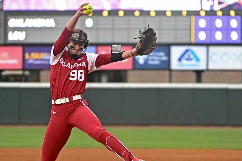 Oklahoma starting pitcher Jordy Bahl throws to an LSU batter during an NCAA college softball...