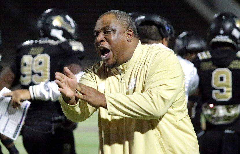 South Oak Cliff High School head coach Jason Todd questions a spot during the first half as...