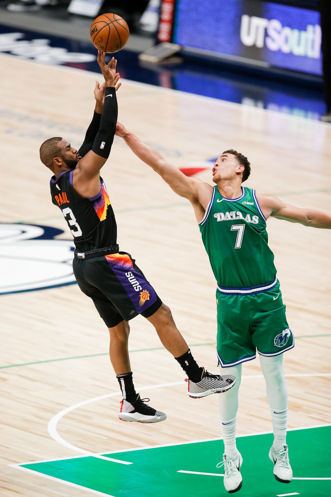 Phoenix Suns guard Chris Paul (3) attempts a shot as Dallas Mavericks forward Dwight Powell...