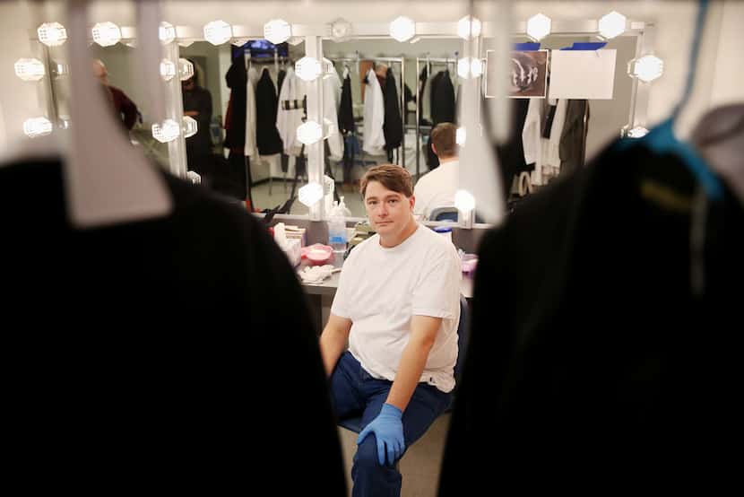 Ben Bryant, who plays Nigel Grouse, sits for a photograph before demonstrates the process of...