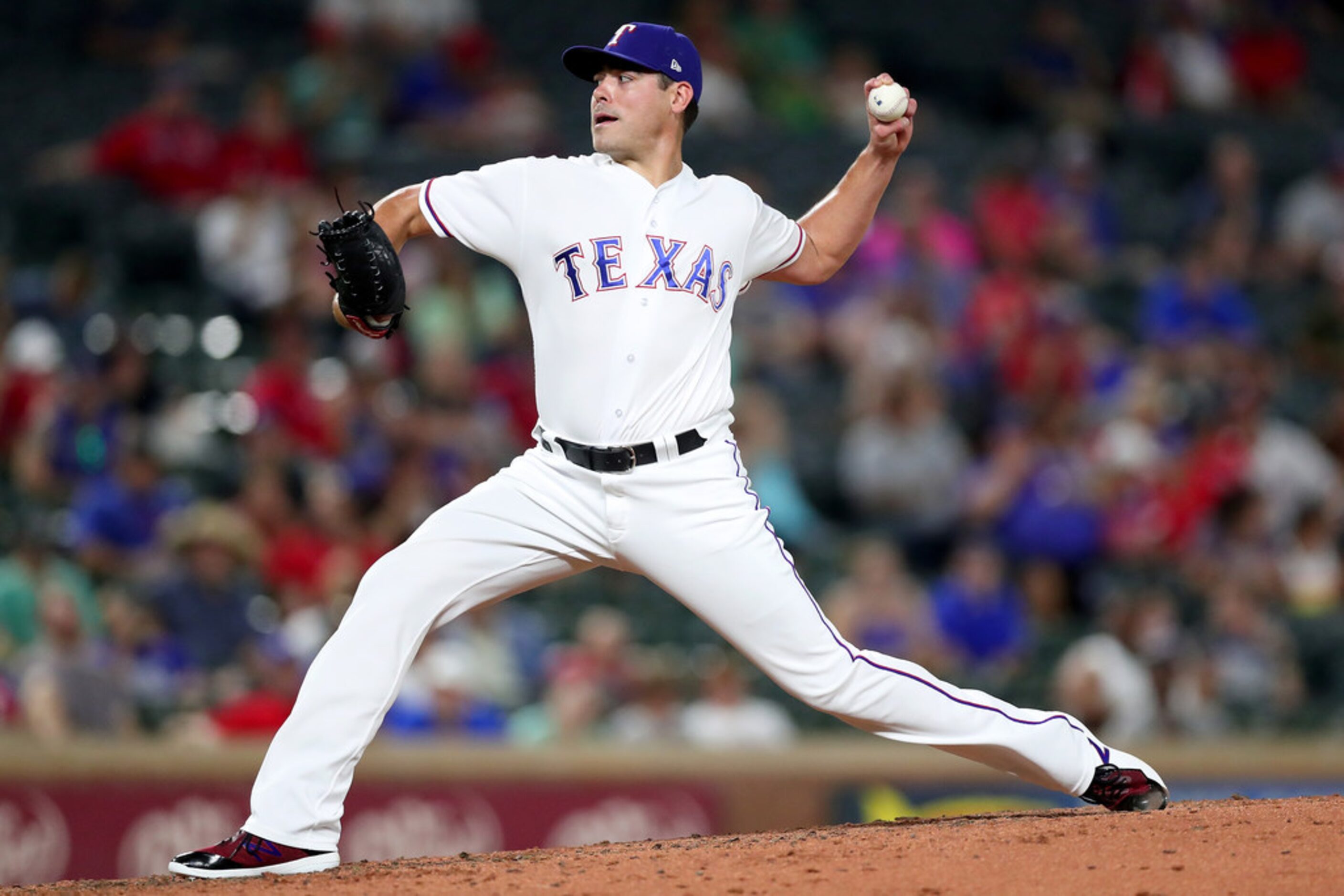 ARLINGTON, TX - JULY 23:  Matt Moore #55 of the Texas Rangers pitches against the Oakland...