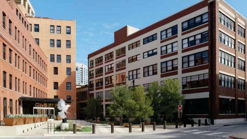 The Oilwell Supply Building, on the right, is across the plaza from the Factory Six03 building.