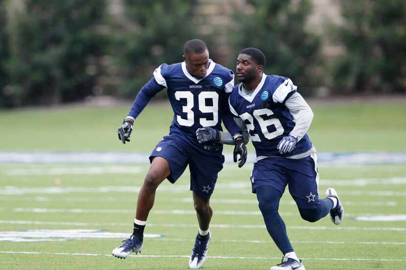 Dallas Cowboys cornerback Marquez White (39) and Dallas Cowboys cornerback Duke Thomas (26)...