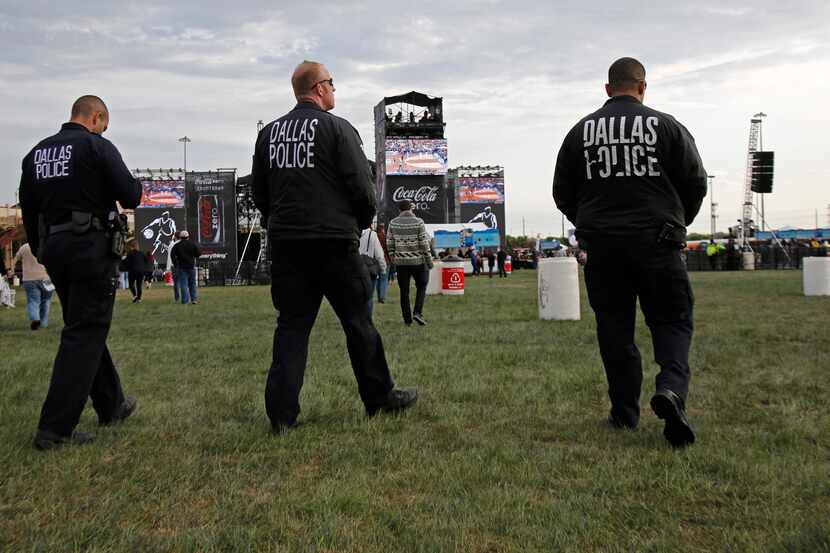 Dallas police on patrol at the March Madness Music Festival at Reunion Park in Dallas April...