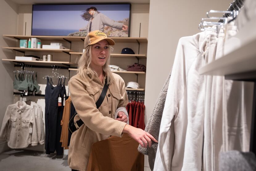 Kourtney Isaacson, 26, shops at active wear clothing retailer Vuori at NorthPark Center in...