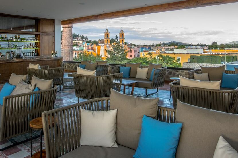 The rooftop bar at the Rosewood Puebla offers great views of the city and its Baroque...