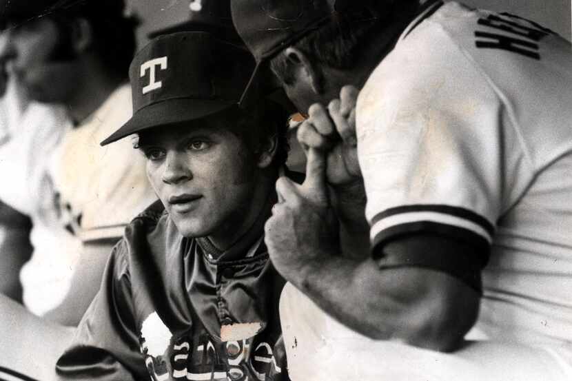 David Clyde, an 18-year-old bonus baby with the Texas Rangers, gets some advice from manager...