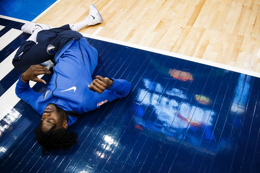 Dallas Mavericks center Nerlens Noel stretches before an NBA basketball game against the...