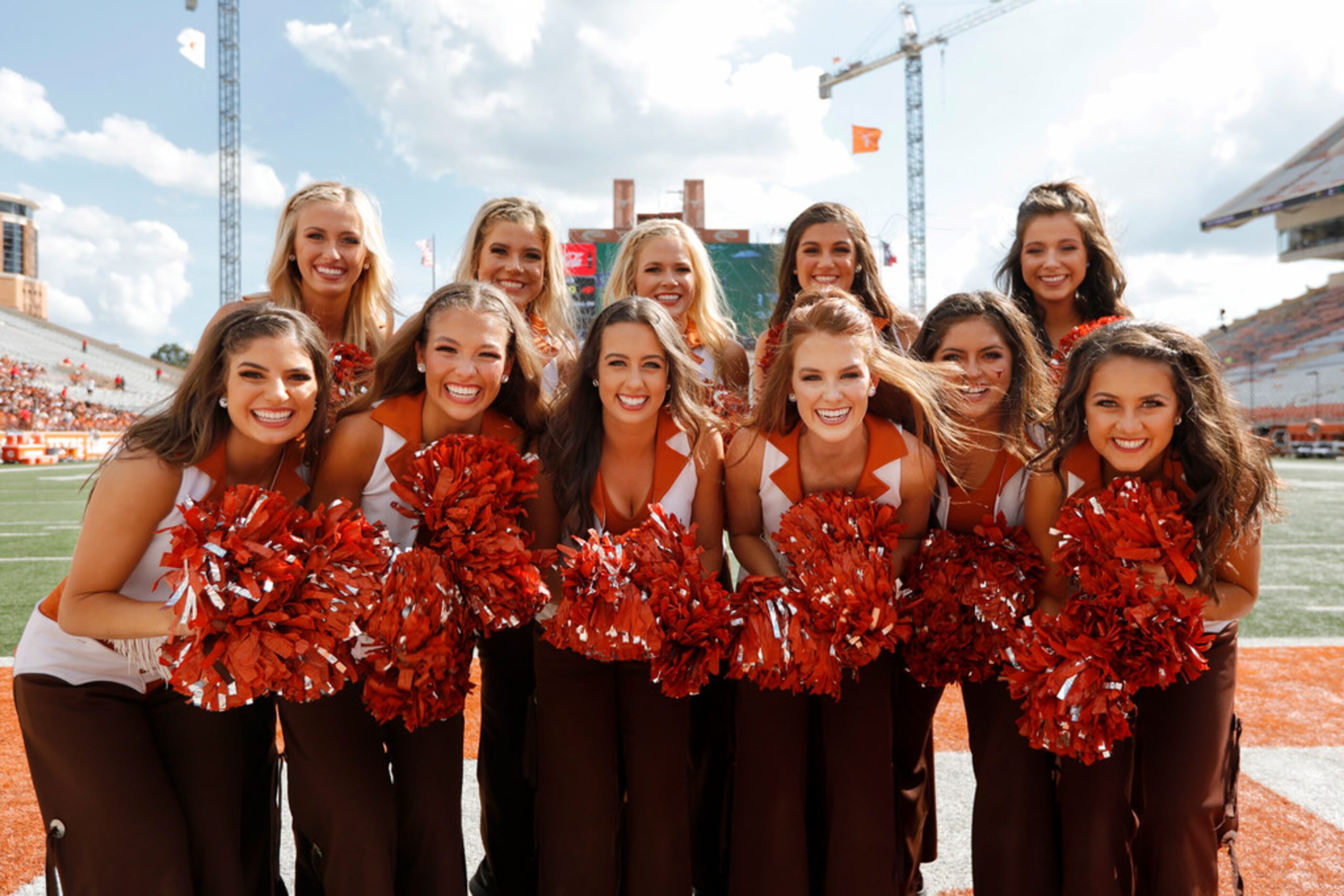 AUSTIN, TX - SEPTEMBER 21:  Members of the Texas Longhorns Pom Squad pose for a photo before...