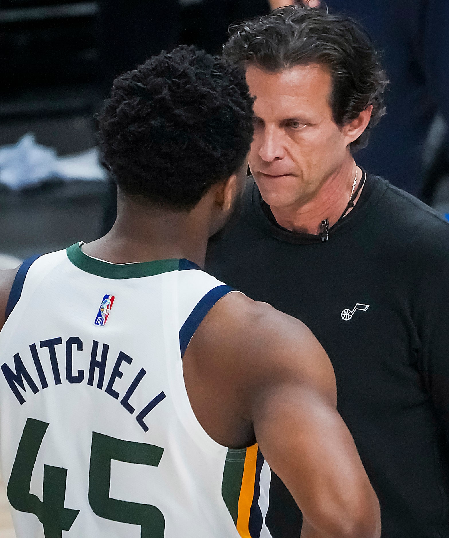 Utah Jazz head coach Quin Snyder talkes with guard Donovan Mitchell during a timeout in the...