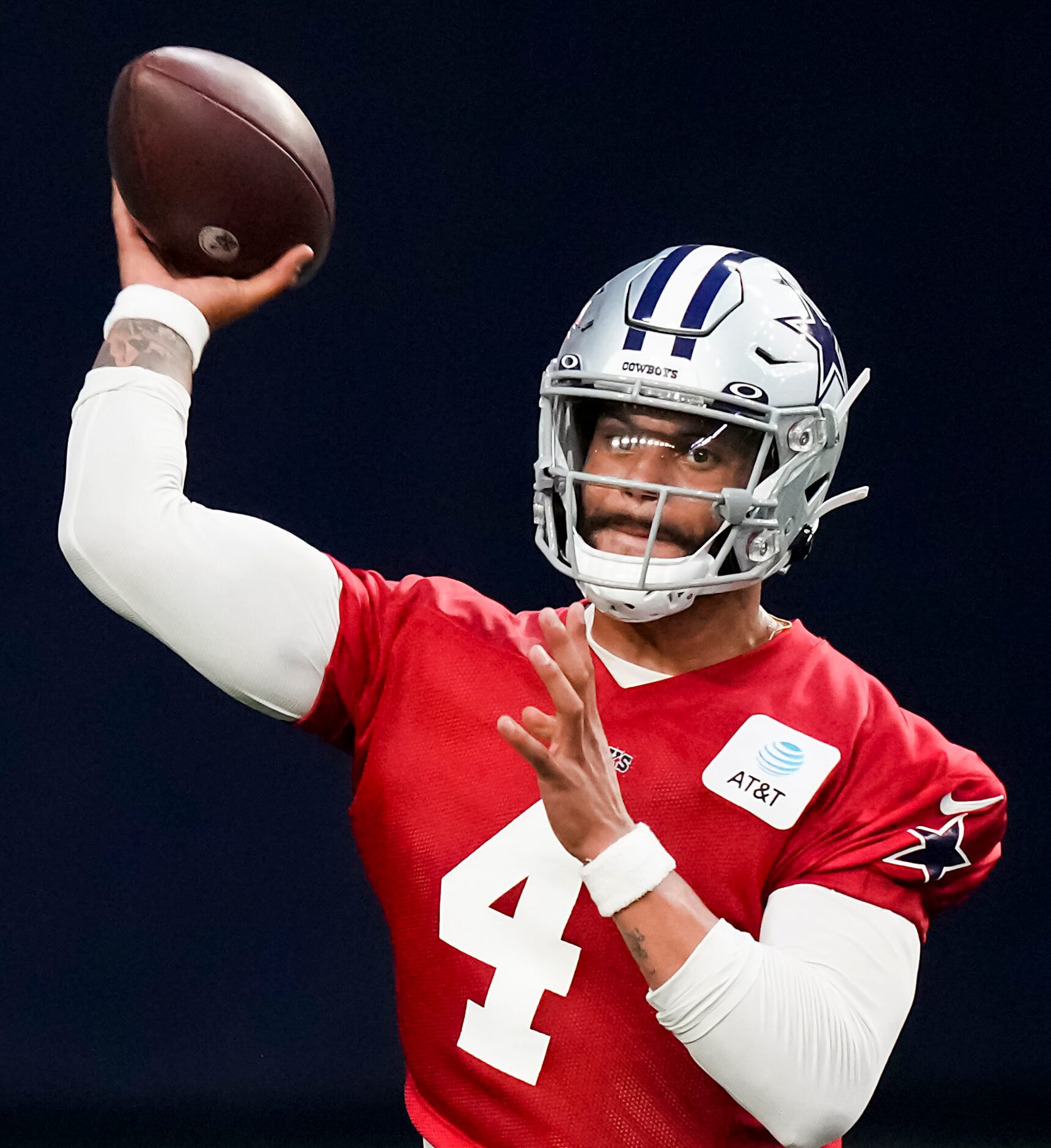 Dallas Cowboys quarterback Dak Prescott (4) throws a pass during the OTA team's practice at...