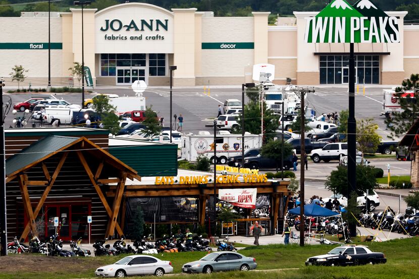 Authorities investigated a mass shooting at the Twin Peaks restaurant in Waco on May 18, 2015.