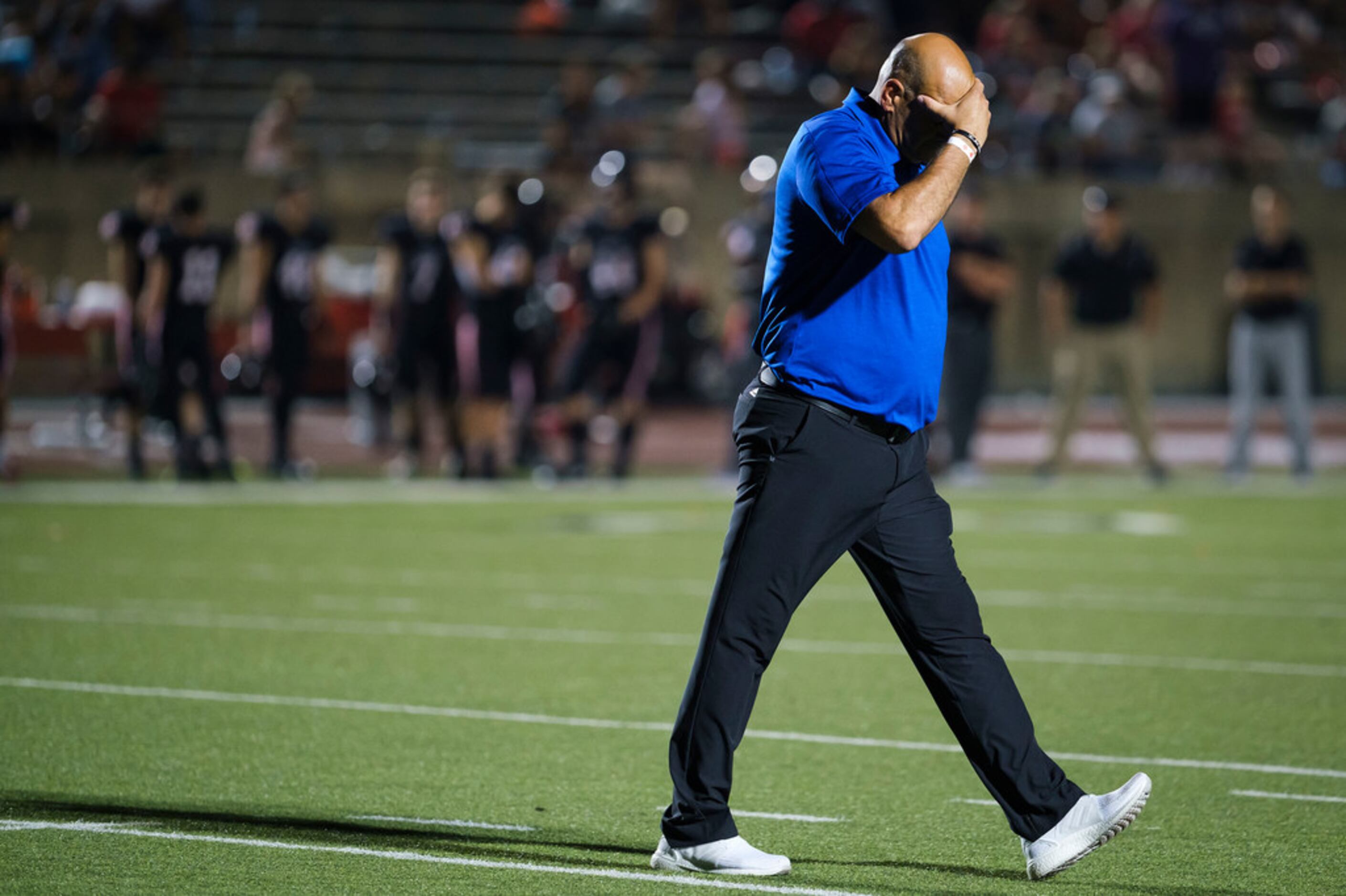 Hebron head coach Brian Brazil reacts after a Coppell touchdown during the second half of a...