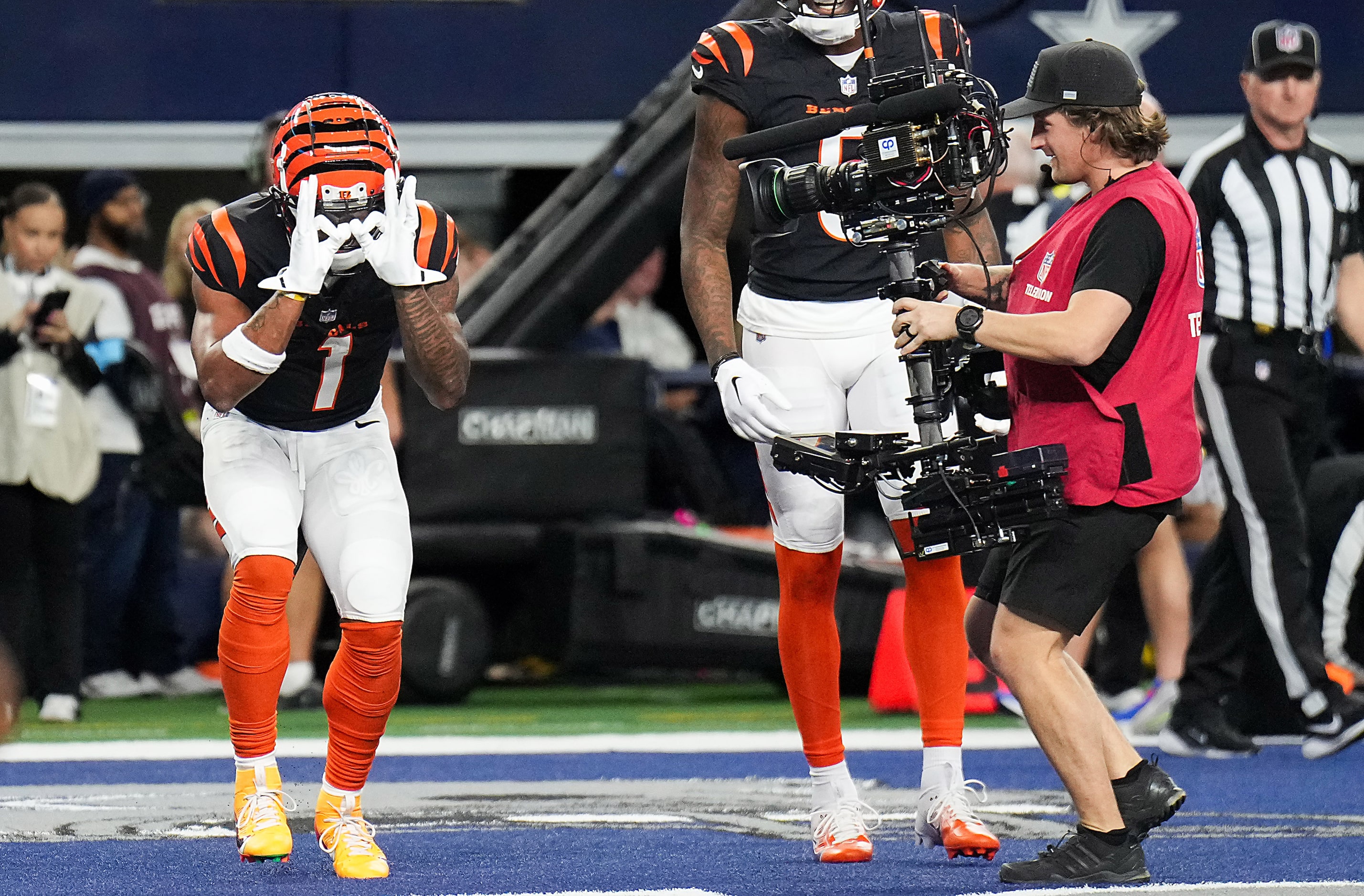 Cincinnati Bengals wide receiver Ja'Marr Chase (1) celebrates after a touchdown  reception...